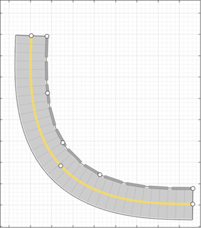 A curved road with Jersey barrier along its right edge