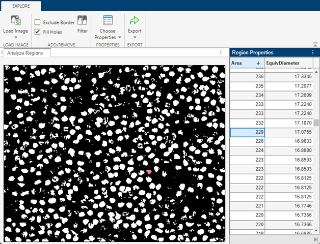 In the Image Region Analyzer app, the region with area 229 is selected in the table of region properties, and the corresponding region in the binary images is highlighted in red.