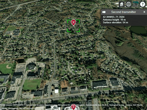 Two transmitter sites displayed over a satellite basemap. An information box shows the coordinates, antenna height, and surface elevation for the second transmitter.