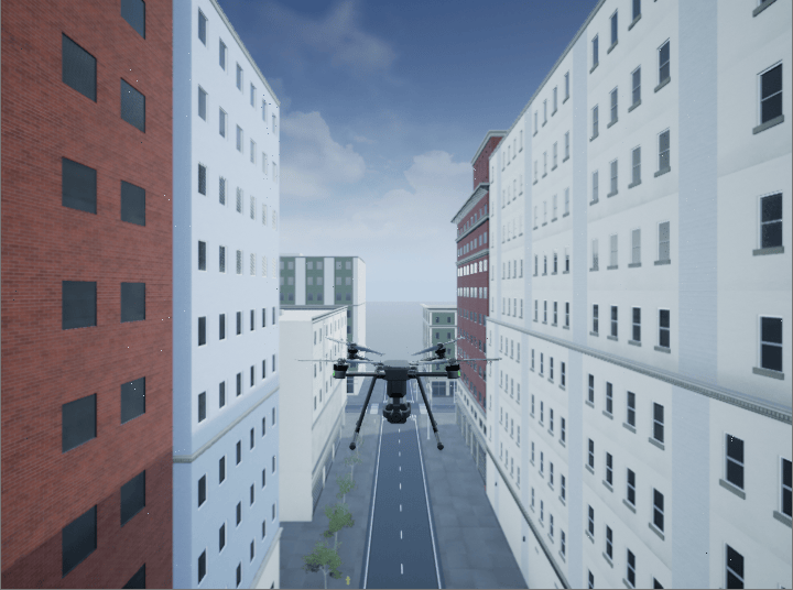 UAV flying between buildings in the Unreal Engine 3D urban environment